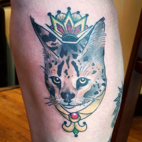 Pardon the TERRIBLE quality photo, but thanks Sarah for getting my Savanah cat drawing tattooed on you!