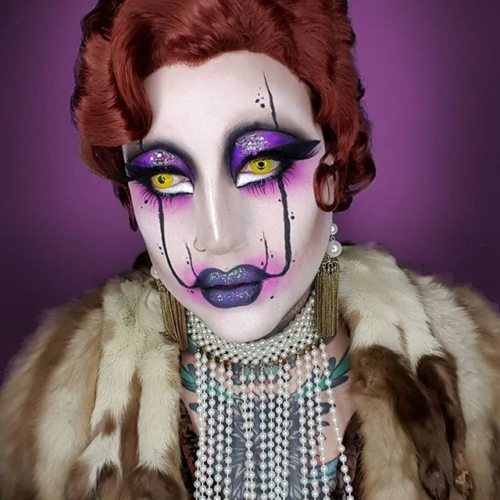 This lewk is from my 2017 month of Halloween looks I do every October. It was the same month the IT remake came out, which is where the idea for the lines coming upward from the mouth came from.